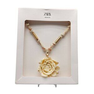 Zara Cream Floral Pendant Necklace With Gold Accents Knotted Fabric Cord